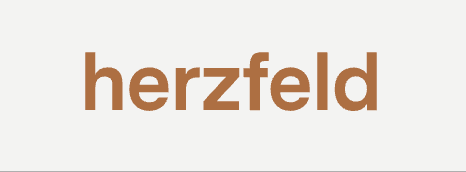Herzfeld Wordmark Logo Herzfeld wordmark logo in brown text.